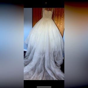 Weeding dress, tag size is 6, but fits sizes 8-10. It was bought from Eva in IL